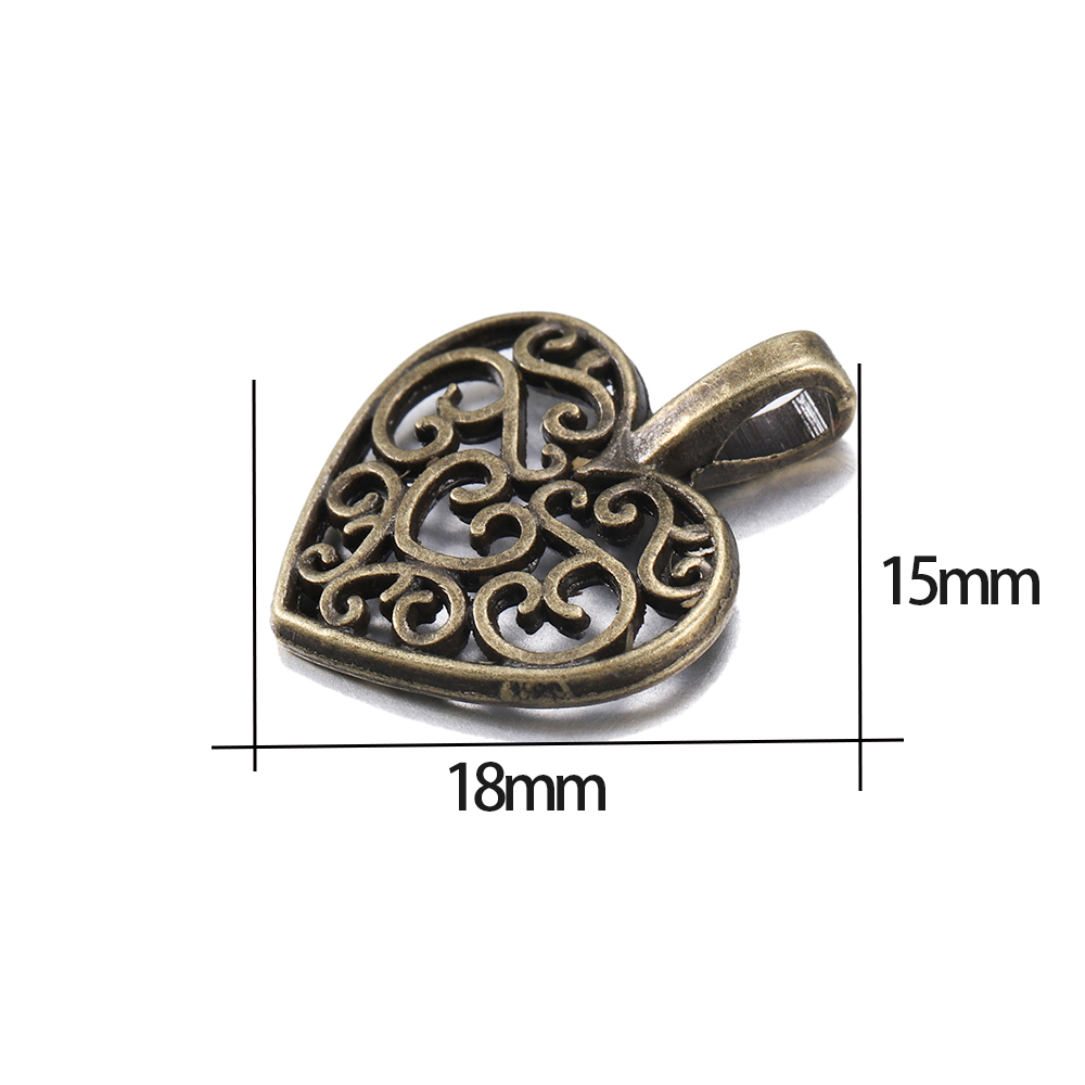 Dijes de corazón de amor hueco - Vintage Fashion Nz reseña y precio
